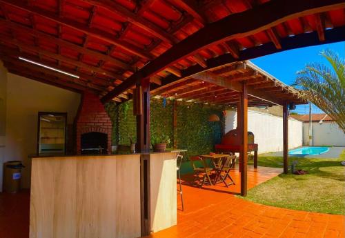 Casa com churrasqueira e piscina in อเมอริคาน่า