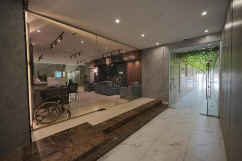 Bejárat, عنبر للوحدات السكنية المفروشة - Amber Hotel in Al Aziziyah