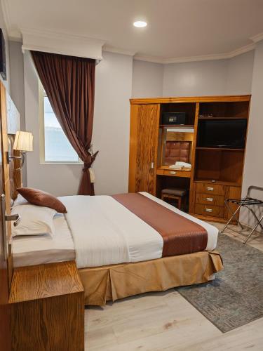 Traveller Inn Serviced Apartments (Economy)  ترافيلر إن للشقق المخدومة (اقتصادي) Room Type - Deluxe Two-Bedroom Apartment