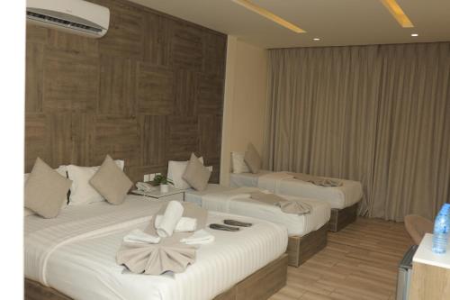 Sky Hotel – Al' Aqabah, TX