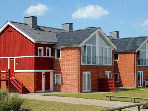 4 person holiday home on a holiday park in Lemvig