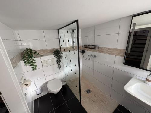 Zuhanyzó, Lühnder Ferienwohnung (Luhnder Ferienwohnung) in Algermissen