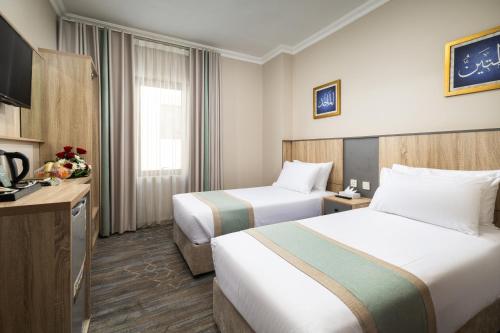 Chambre avec 2 lits