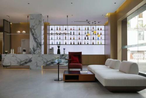 ห้องส่วนกลางสำหรับนั่งเล่น/ดูทีวี, Shengpin International Hotel Guilin Two Rivers and Four Lakes Elephant Trunk Hill Branch in สถานีรถไฟกุ้ยหลิน