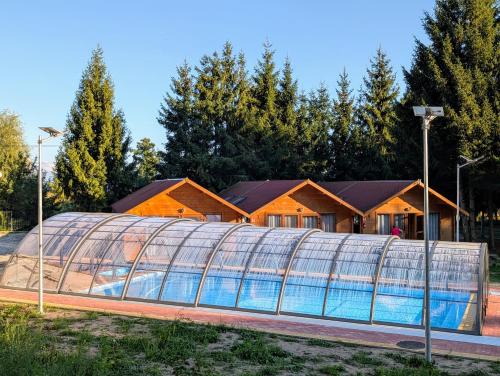 Басейн, Całoroczny drewniany domek Superior i apartamenty Eko-oaza w Krynica Morska-Piaski (Caloroczny drewniany domek Superior i apartamenty Eko-oaza w Krynica Morska-Piaski) in Modrzyca
