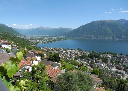 razgled, Casa Santa Barbara by HolAp SA in Brione sopra Minusio