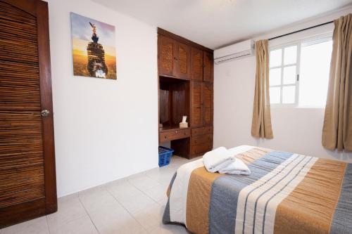 Room with shared bathroom in the heart of Cancun, Cancún (fotografie 6)