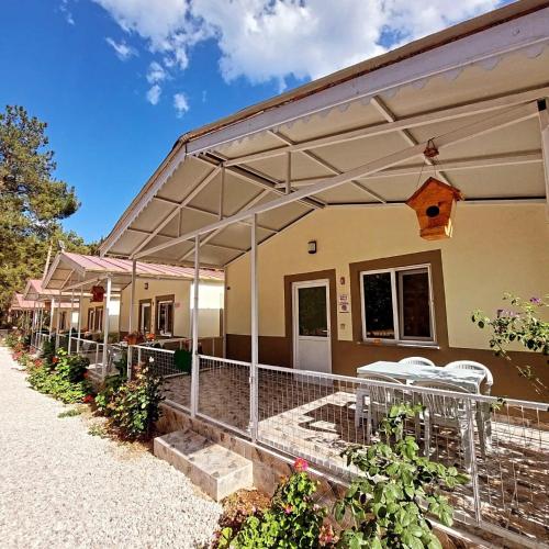 OLYMPOS YÖRÜK OTAĞI APART EVLERİ