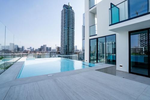 Modern 1BR Apt in Binghatti Gardenia with Pool & Gym! near Jumeirah Village Circle