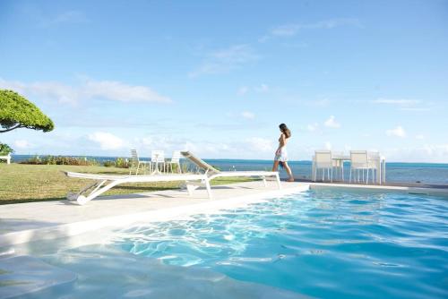 Le Ficus Grande villa bord de mer avec piscine in Ti'ama'o