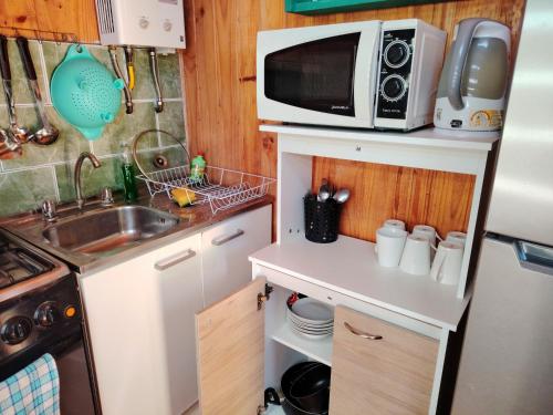 Cabañas y Hostal Karibe (Cabanas y Hostal Karibe) in Πιτσιλεμου