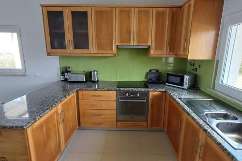 Casa Condor - Moradia com piscina a 5 min da praia in อเรยา บรังกา