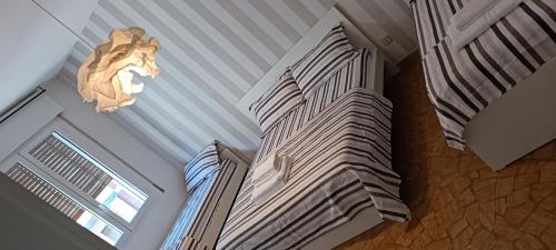 Affittacamere Pratello 97 Room Type - Comfort Quadruple Room