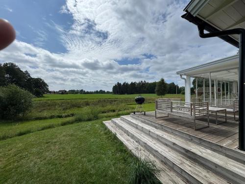 Peaceful cottage,field views, Near Lake with Boat in Bolmso