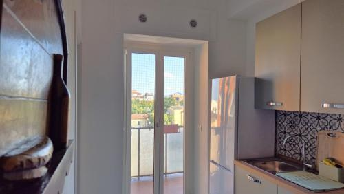 Cocina, Quinto Piano Panoramic Apartment in the center in Forli City Center