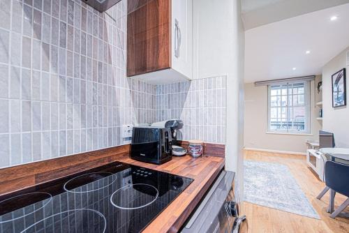 Stylish 1BR Apartment by Covent Garden, Londres (foto 8)