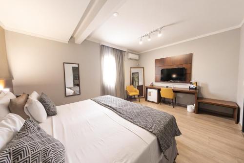 Class Hotel Varginha in วาร์กิงญา