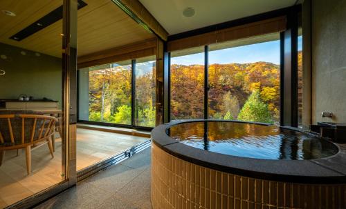Hot spring bath, Chalet Ivy Jozankei in Jozankei
