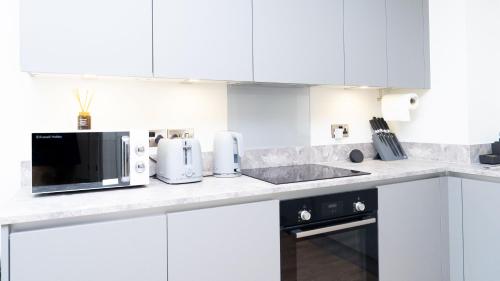 Luxe Apartment in M1 with Pool, Gym & Spa, Manchester (Foto 10)