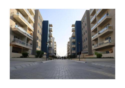 ทัศนียภาพ, Serene 1BR Escape - Al Reef with Pool in สนามบินนานาชาติอาบูดาบี