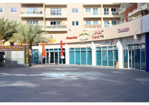 Shops, Elegant 1BR - Al Reef Urban Haven in Abu Dhabi International Airport