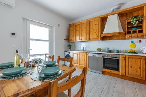 Kitchen, GuestHost - Bike Lane Apt between Pisa and the Sea in Pisa