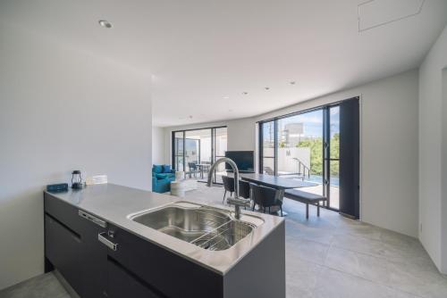Kitchen, Villa M BAYFRONT YONAHA -Pool&Sauna Retreat- in Miyakojima