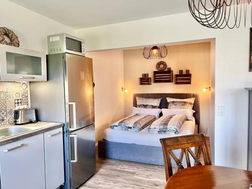 fewo1846 - Strandresidenz Wassersleben UferNest - modernes Studioapartment mit Balkon am Strand, Харрисле (фото 9)
