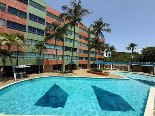 숙소 외관, Cozy and Relaxing Oceanfront Apartment in 투카카스