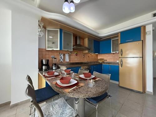 Kitchen, Cozy and Relaxing Oceanfront Apartment in Tucacas