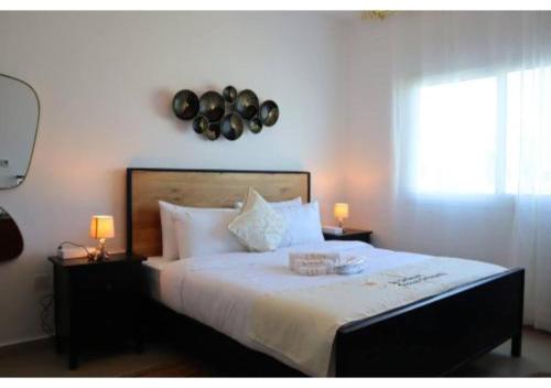 Divine 1BR Apartment - in Al Reef Downtown Community
