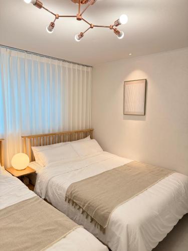 Rym Stay, Cozy 2BR, 3 Beds with Kitchen near Lotte Tower, Lotte World, KSPO Dome, & COEX, Licensed stay, Seoul (Foto 6)