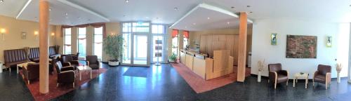 Közös társalgó / TV, Hotel Ambiente in Halberstadt