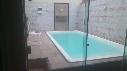 Casa em condomínio com piscina e churrasqueira (Casa em condominio com piscina e churrasqueira) in Fazendinha