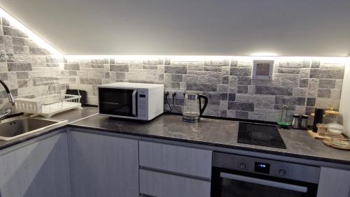 virtuve, Gastro Garden Guesthouse in Aramusa