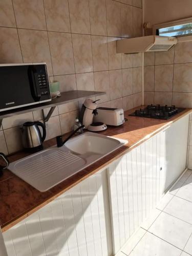 Konyha, Maison confortable au Bois des Nefles, 70 m² avec piscine partagee in Saint Paul