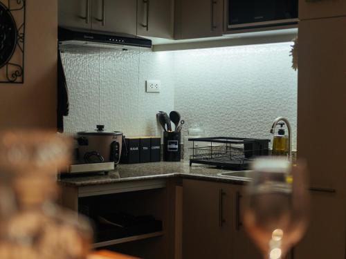 Kitchen, Hannah's Place 1-Bedroom at Amani Grand Condominium in Cabantian