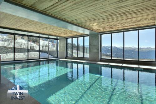 ARC 1600, LE RIDGE, Appartement 07 personnes Vue Montagne - ski aux pieds - Sauna, Hammam, Piscine, Salle de salle de sport-fitness, Arc 1600 (photo 7)