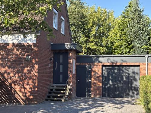 ทัศนียภาพภายนอกโรงแรม, Wacholderweg, Ferienhaus in ชเนเฟอร์ดินเกน