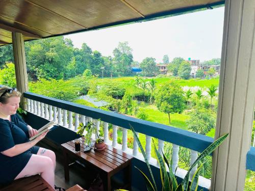 발코니/테라스, 치트완 빌리지 리조트 (Chitwan Village Resort) in 치트완