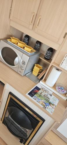 Les Tournesols in ميدلكيركى