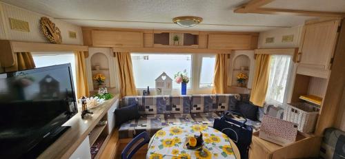 Les Tournesols in ميدلكيركى