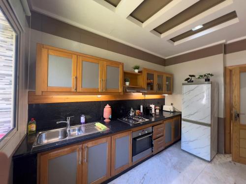 Family Apartment à Jnane California Confort & Proximité (Family Apartment a Jnane California Confort & Proximite) in 아인 초크