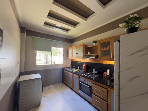 Family Apartment à Jnane California Confort & Proximité (Family Apartment a Jnane California Confort & Proximite) in 아인 초크