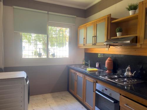 Family Apartment à Jnane California Confort & Proximité (Family Apartment a Jnane California Confort & Proximite) in 아인 초크