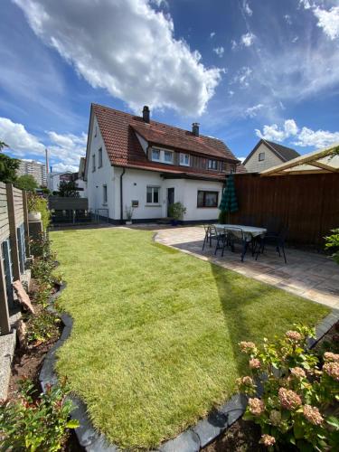 Modernes Ferienhaus mit Kochinsel, Garten, 2 Parkplätze inkl, 4-8 Pers