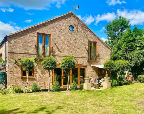 Paddock lodge,Beautiful unique 4 bed barn conversion near York in Melbourne (East Riding of Yorkshire)