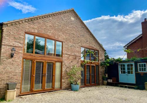 Paddock lodge,Beautiful unique 4 bed barn conversion near York in Melbourne (East Riding of Yorkshire)