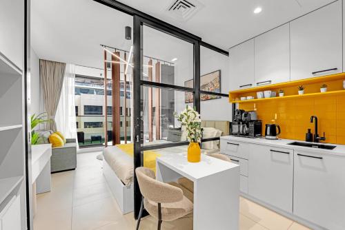 Waves - Cozy & Modern JVC Escape With Pool & Gym Access in Jumeirah Village Circle