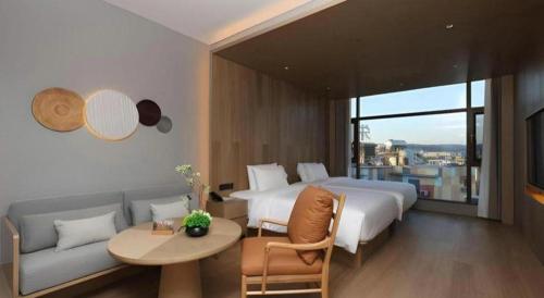 Vienna Hotel Yunnan Maitreya Huquan